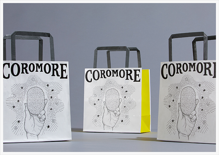 「COROMORE」の紙袋